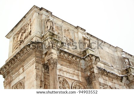The Arch of Constantine covered by snow, a really rare event in Rome
