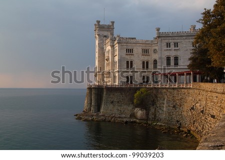 Miramare Castle in Trieste Italy, a white castle overhanging the sea