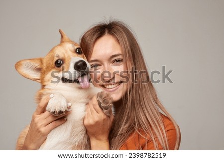 Similar – Foto Bild Frau hält Hund zu Hause