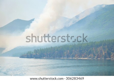 Forest fire on western shore of Lake Baikal in Sandy Bay area