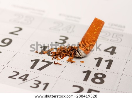 Broken cigarette butt. Stop smoking now. Take care of health