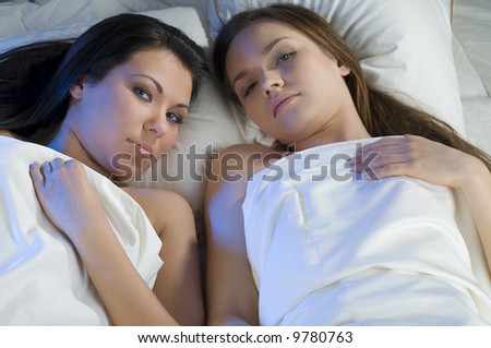 Close Up Of Two Sweet Girls Friend In The Same Bed Looking Camera Stock ...