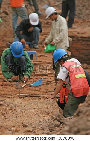 Archaeologists doing excavation work in Vientiane, Laos