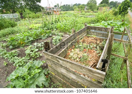 Compost bin in a vegetable garden