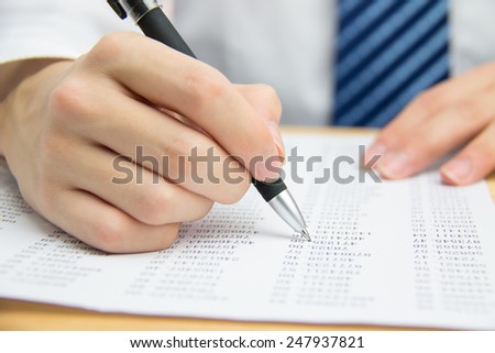 Businessman calculating the financial statements