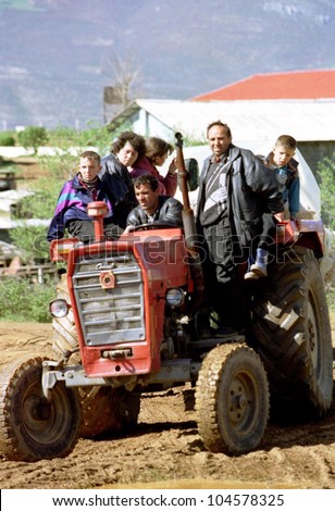 KUKES, ALBANIA, 17 APRIL 1999 -- An ethnic Albanian Kosovar family arrives at a refugee camp along the Kosovo border. The family had been driven from their home in Kosovo by Serbian security forces.
