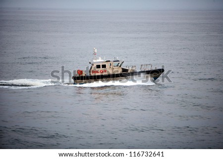 NEW YORK - JULY 1: A New York City Port Authority Pilot boat navigates the upper New York City harbor on Sunday,  July 1, 2012