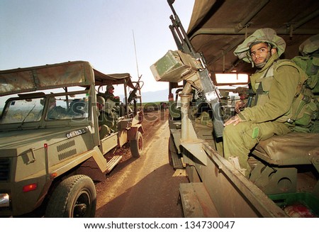 LILACH - MARCH 28:  Israeli army (IDF) soldiers patrol the  Israeli Lebanese border March 28, 2000.