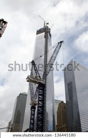 NEW YORK CITY - APRIL 19: Cranes from Swedish construction company Skanska stand in front of the World Trade Center in New York City, on Friday, April 19, 2013.