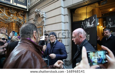 NEW YORK CITY - DECEMBER 28, 2013: Actor Daniel Craig greets fans outside of a Broadway theater where he is starring in a production of the play Betrayal.