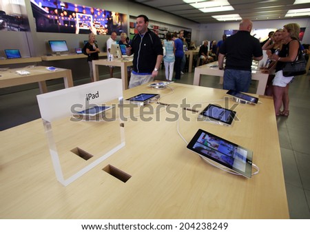 LAS VEGAS, NEVADA - FRI. JUNE 27, 2014:  People  shop at an Apple Computers retails store in Las Vegas, Nevada, on Friday, June, 27, 2014.