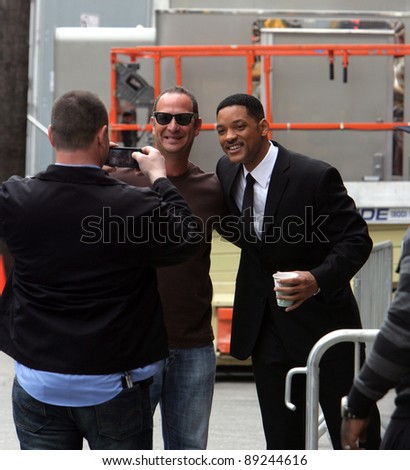 NEW YORK CITY - APRIL 15: Actor Will Smith greets fans on the set of \