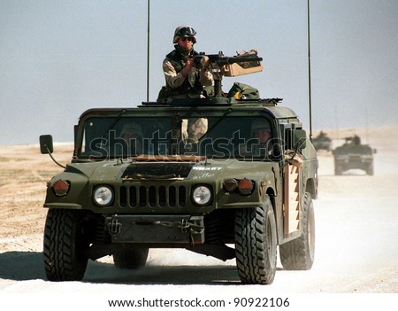 KUWAIT-IRAQ BORDER - FEBRUARY 19: United States Army troops patrol the Kuwaiti border with Iraq on Feb 19, 1998 on the Kuwait-Iraq border.