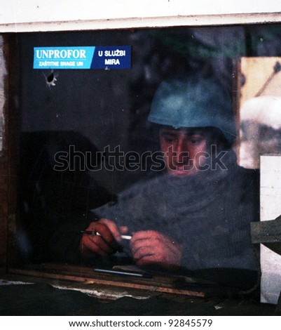 TURANI, CROATIA - SEPT 2: A lone French soldier, in the Balkans with the United Nations\' UNPROFOR, mans a checkpoint in Turanj, Croatia, on Tuesday, September 2, 1993.