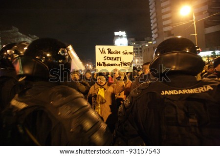 BUCHAREST, ROMANIA - JAN 19: Demonstrators protest against a series of unpopular austerity measures enacted by the government in Bucharest, Romania, on Thursday, January 19, 2012.
