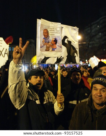 BUCHAREST, ROMANIA - JAN 19: Demonstrators protest against a series of unpopular austerity measures enacted by the government in Bucharest, Romania, on Thursday, January 19, 2012.