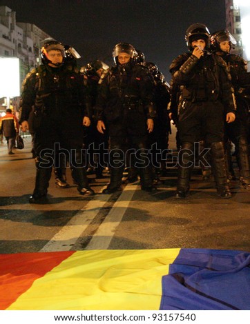 Demonstrators protest against a series of unpopular BUCHAREST, ROMANIA - JAN 19: Demonstrators protest against a series of unpopular austerity measures enacted by the government in Bucharest, Romania, on Thursday, January 19, 2012.measures enacted by the