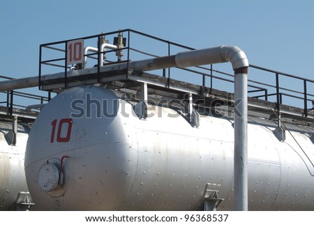 SOUTH CENTRAL RUSSIA - JULY 26: Storage tanks and transmission facilities at TNK-BP\'s Udmurtia oil fields on Tuesday, July 26, 2005 in south-central Russia