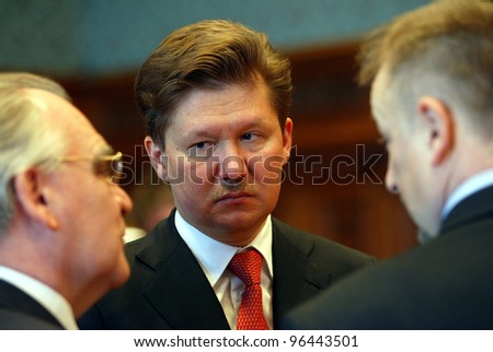 BUDAPEST, HUNGARY - APRIL 1: OAO Gazprom Chief Executive Alexei Miller, center, speaks to Mol Rt. Chief Executive Zsolt Hernadi, right, in the Hungarian Parliament on April 1, 2005 in Budapest, Hungary,