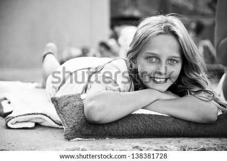 italian teenager relaxing at the sun - black and white photo