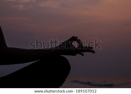 meditation and yoga practicing in morning, serenity and sea background