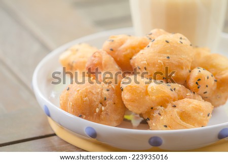 Soybean milk with deep-fried dough stick and black sesame seeds