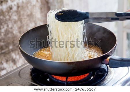 fried noodle in pan for thai food menu
