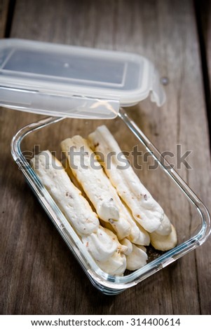 meringue dessert in plastic box