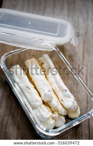 meringue dessert in plastic box