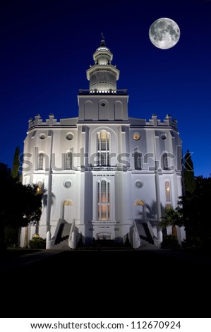 St. George Utah Temple of The Church of Jesus Christ of Latter-day Saints, at night with a full moon.