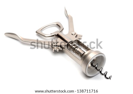 The metal lever-type corkscrew isolated on white.