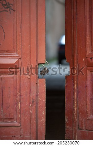 Old wooden door open
