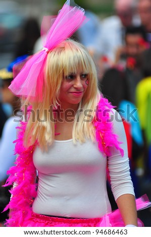 LIMASSOL, CYPRUS - MARCH 6: Young woman  dressed as Lady Gaga begins her march from the starting point of a Grand Carnival Parade at Ayios Nikolaos Round About on March 6, 2011 in Limassol, Cyprus.