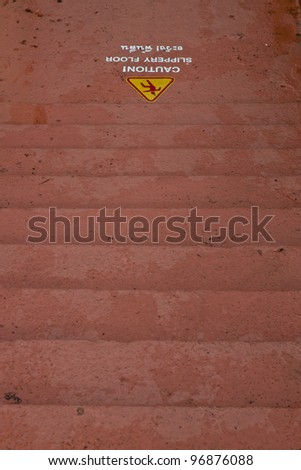 Stairway, caution slippery floor