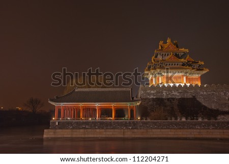 turret of the palace museum at night in beijing,China