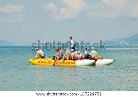 KRABI, THAILAND - JANUARY 13: Tourist boats in the sea at Bamboo island on January 13, 2013. Krabi is the popular destination for tourists on every summer