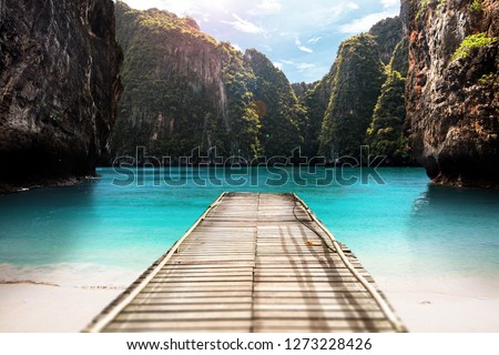 Tourism, travel or vacations concept. Tropical resort in Thailand. Andaman sea jetty in lagoon - Exotic Paradise Stock fotó © 