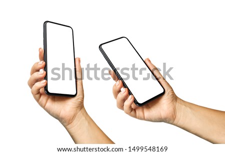 Woman hand holding the black smartphone with blank screen and modern frameless design in two rotated perspective positions  - isolated on white background 商業照片 © 