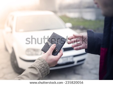 Transmission car documents and keys to close the deal after buying a car