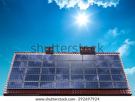 Photovoltaic PV panels on house roof - Photovoltaics (PV) is the name of a method of ecological converting solar energy into direct current electricity
