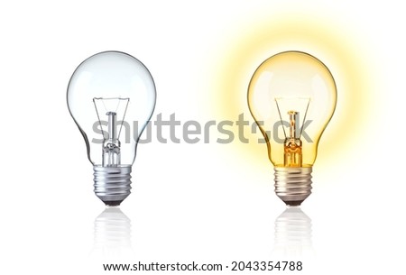Classic light bulb isolate on white background. Turn on and turn off of Tungsten light bulb show big idea,  innovation, save energy, idea of Evolution, old style or retro light bulb Concept.