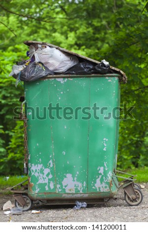 Old container loaded with waste