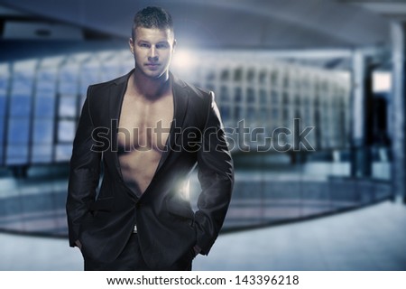 Muscular man in office