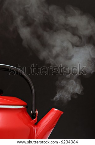 Red kettle steaming hot