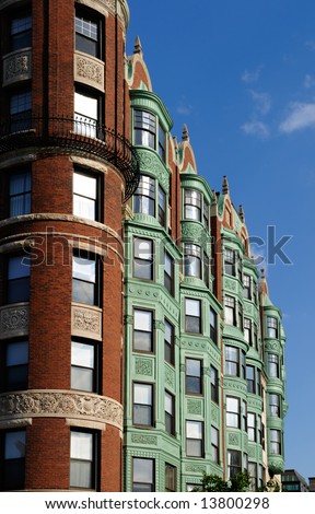 Facade of Barnes Mansion in Boston. Verdigris (copper patina) awning on bay windows gives it a distinctive look.