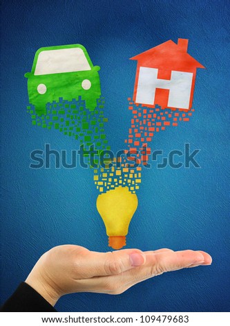 home symbol and car symbol over hand