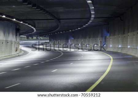 Similar – Image, Stock Photo Highway tunnel. Interior of urban tunnel without traffic in nught with blue lights. Rome, Italy