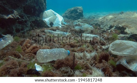 Plastic pollution of the Mediterranean Sea. Massive plastic pollution of the ocean bottom. Seabed covered with a lot of plastic garbage. Bottles, bags and other plastic debris on seabed