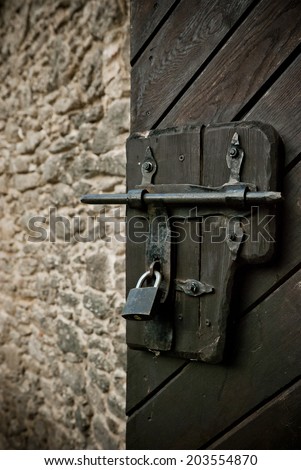 Old lock on open door. Chojnik castle.