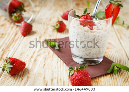 corn flakes with milk and strawberries, food close up